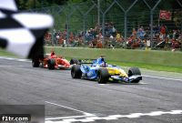 Alonso Weathers Schumacher Storm for Narrow Triumph