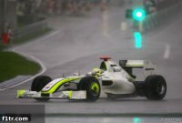 Button’s Sepang Triumph Interrupted by Torrential Rain