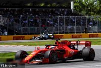 Vettel penalized for Hamilton near-miss