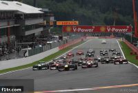 Vettel prevails in dramatic Spa thriller