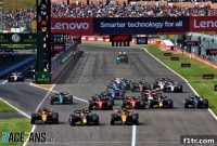 Verstappen Fends Off First-Lap Attack from Norris and Piastri